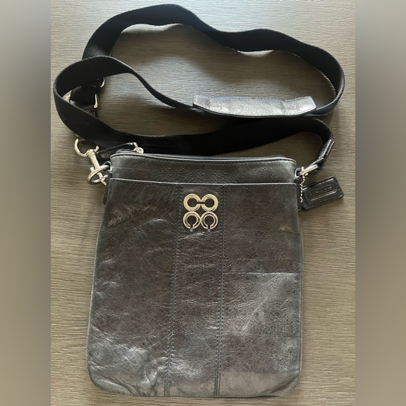 Coachblack metallic swing bag